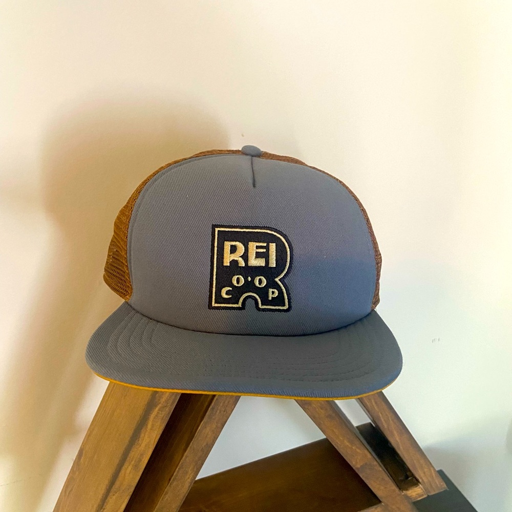 REI trucker has. Never worn. Just tried on